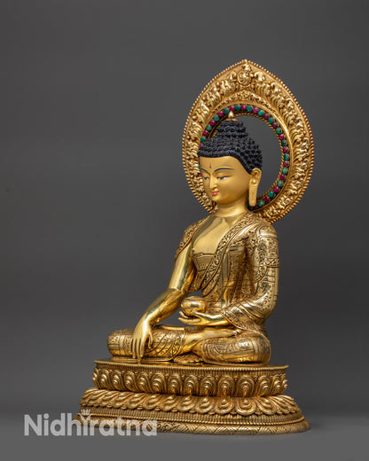 Left view side of Shakyamuni Buddha showing gold-gilded robe and halo details

