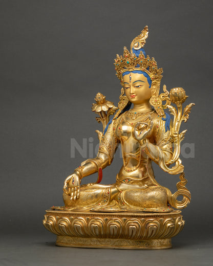 Left view side of White Tara sculpture displaying utpala flower and intricate Himalayan craftsmanship