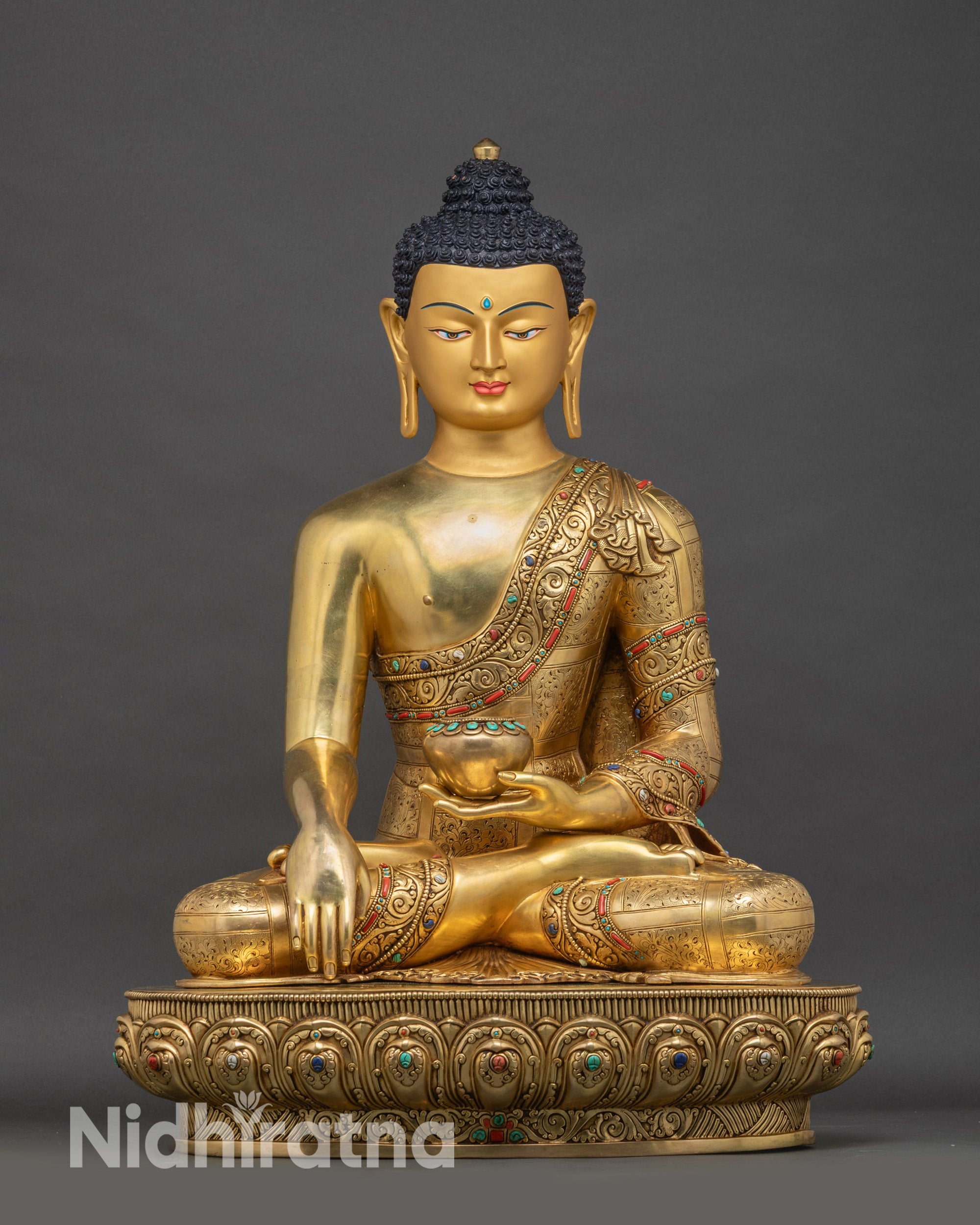 Life-size Shakyamuni Buddha statue front view, handcrafted Nepalese copper and gold gilding