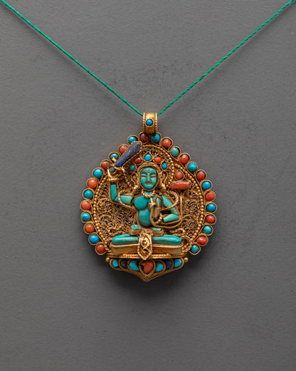 Front angle of Manjushri Locket with turquoise figure and gold-gilded Himalayan filigree design