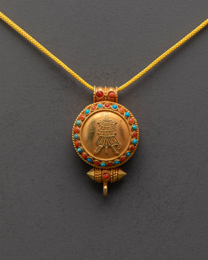 Front view of gold-gilded Tibetan Victory Banner Locket with semi-precious stones

