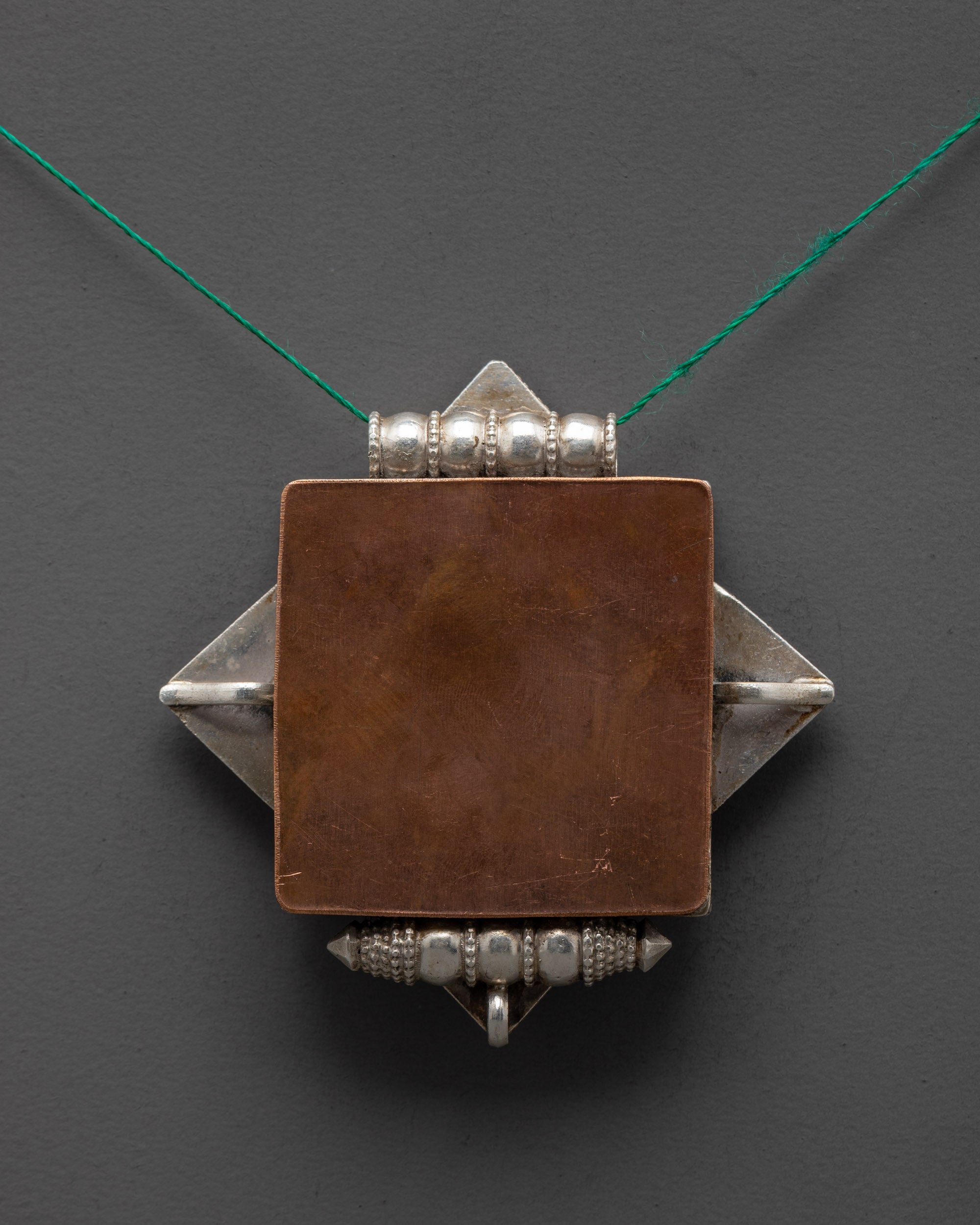 Golden Fish Amulet Locket | Tibetan Prayer Jewelry in Silver