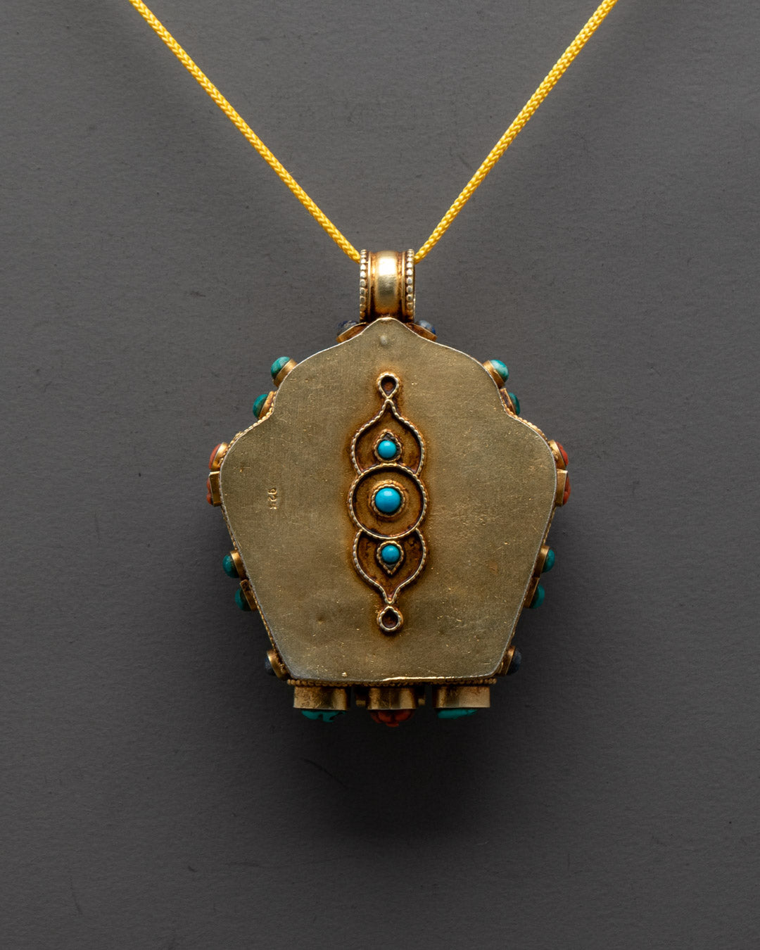 Hand-Carved Green Tara Locket with Vajrayana Buddhist Symbolism