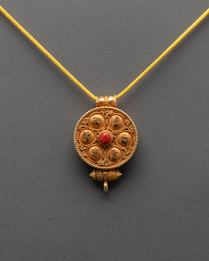 Front view of Tibetan Ghau Amulet Locket with coral and gold filigree for protection