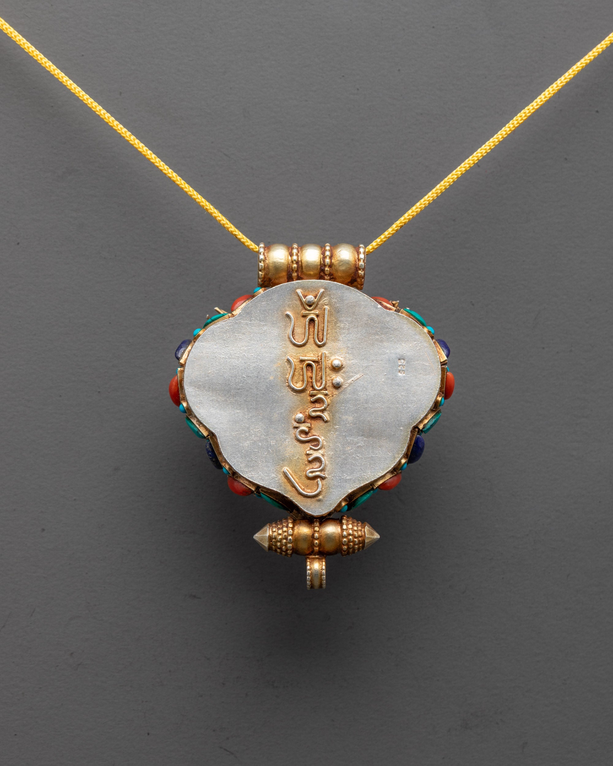 Buddhist Garuda and Dzambhala Praying Locket