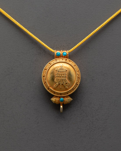 Front view of Gyeltshen Banner Locket with gold-gilded body and semi-precious stones