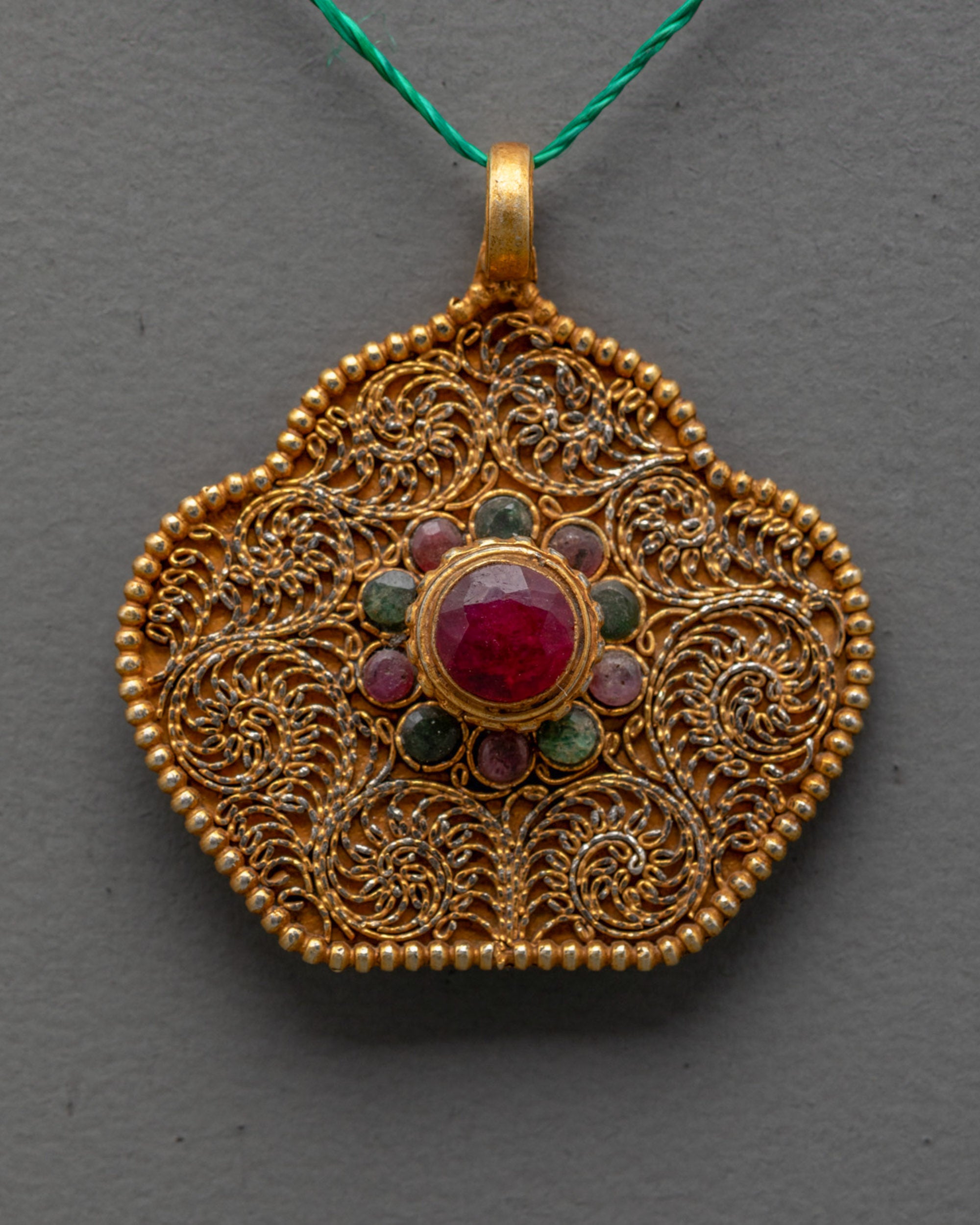 Elegant Ghau Pendant | Handcrafted Nepalese Amulet