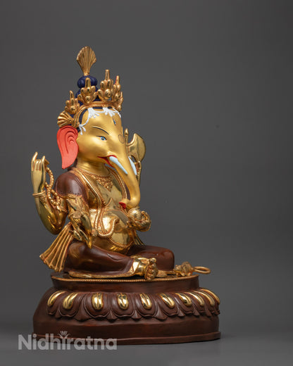 Lord Ganesha holding a modak with his mouse vahana – representing prosperity and cosmic balance