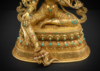 Lower front view Green Tara Statue showing lotus pedestal and flowing robes