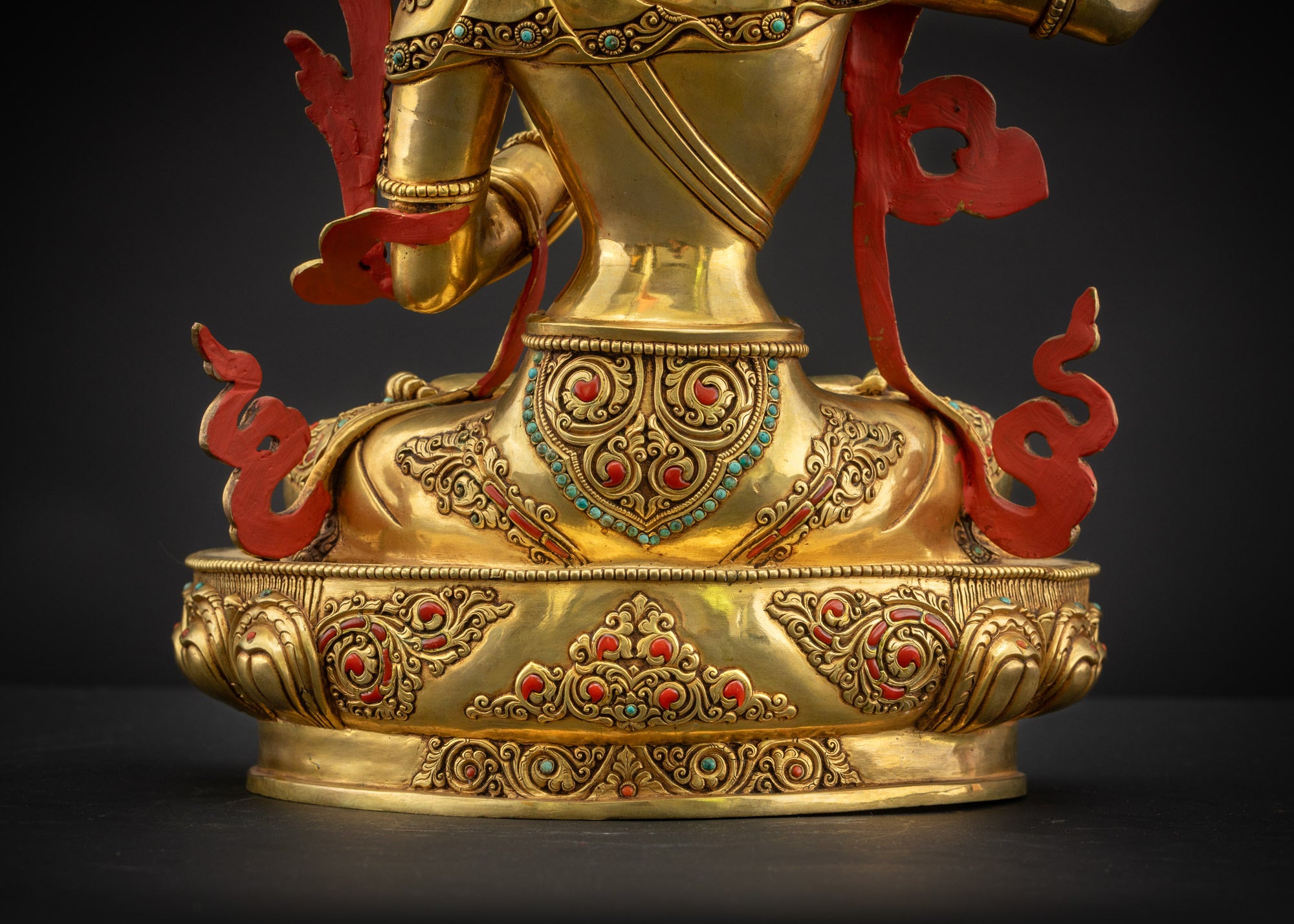 Lower landscape back view of Manjushri Statue showing detailed robe patterns