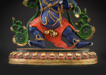Lower landscape front view Vajrapani statue on lotus seat with flaming halo
