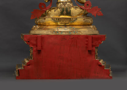 Lower landscape shot back of Green Tara Statue highlighting halo and detailed throne