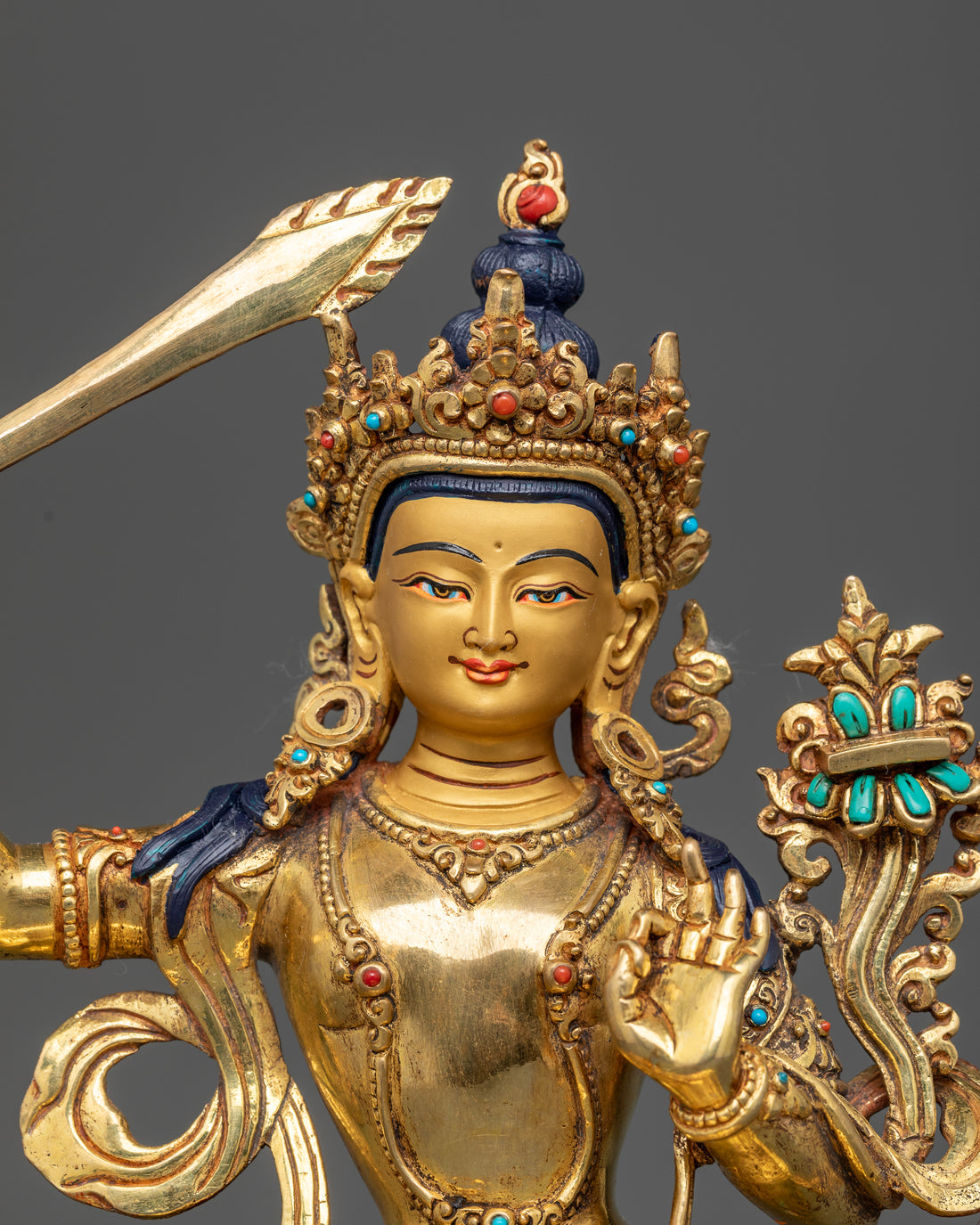 Manjushri Seated on a Lotus Throne with Gemstone Halo