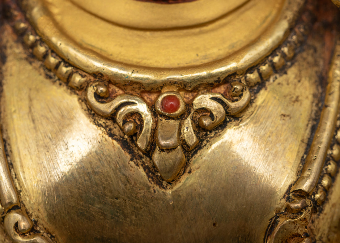 Manjushri Seated on a Lotus Throne with Gemstone Halo