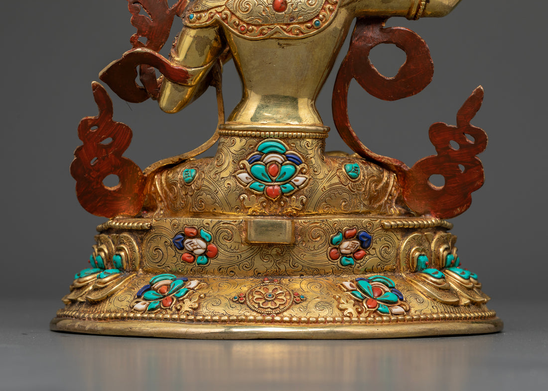 Manjushri Seated on a Lotus Throne with Gemstone Halo