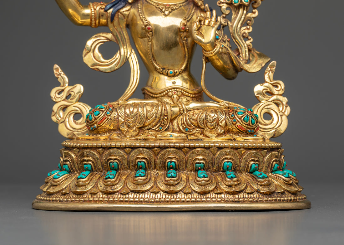 Manjushri Seated on a Lotus Throne with Gemstone Halo