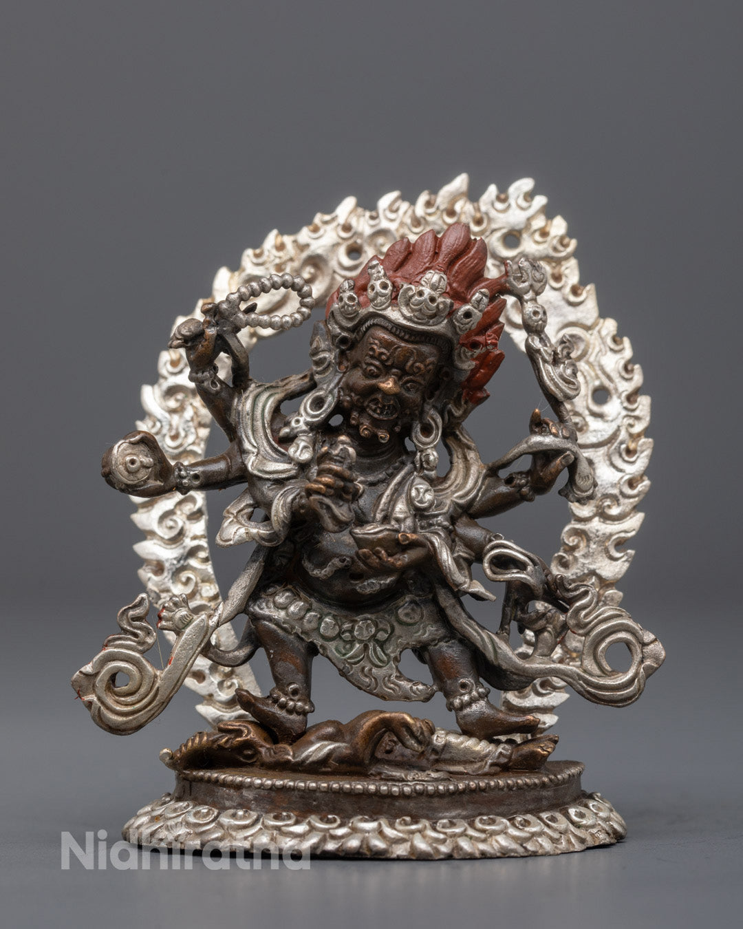 Machine-Made Six-Armed Mahakala Sculpture with silver-plated oxidized copper body and fierce expression