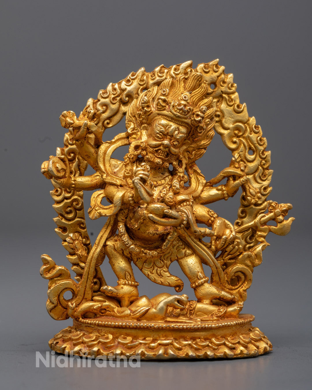 Machine made Six Armed Mahakala statue with gold plated body fierce expression and lotus throne