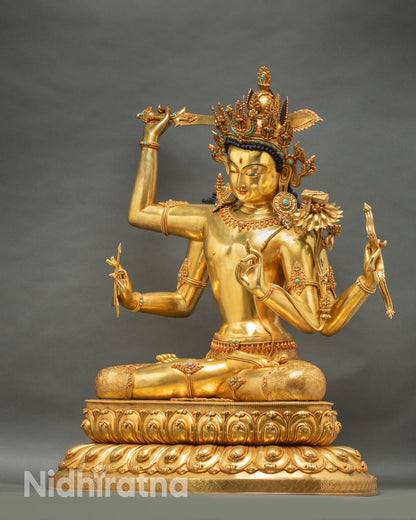 Maha Manjushri statue left side view displaying utpala flower hand, ornate armlet, bow and arrow, and handcrafted gold details