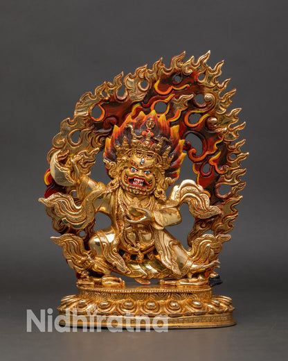 Front view of Nepalese handcrafted Mahakala Bernagchen statue, gold-gilded copper