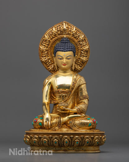 Majestic Gautama Buddha statue front view with 24K gold face and intricate carvings detail

