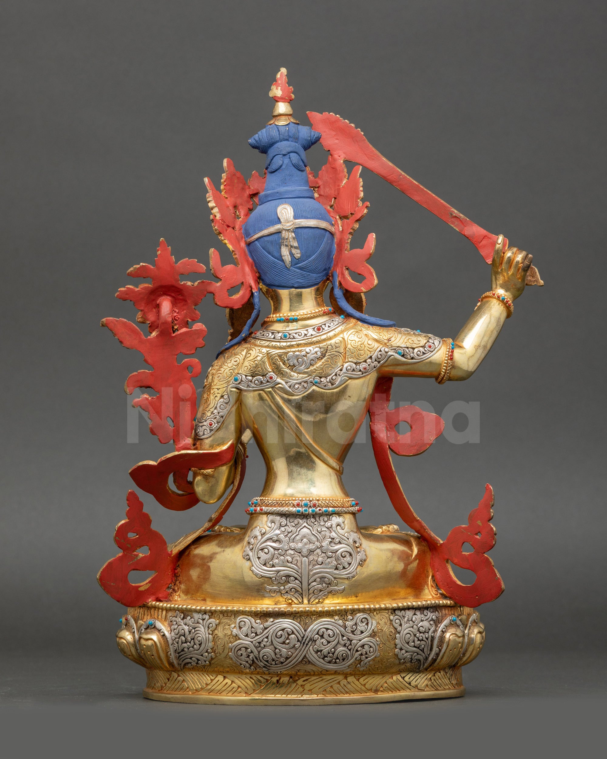 Manjushree Statue detailed back view of carved robes and silver-plated finish