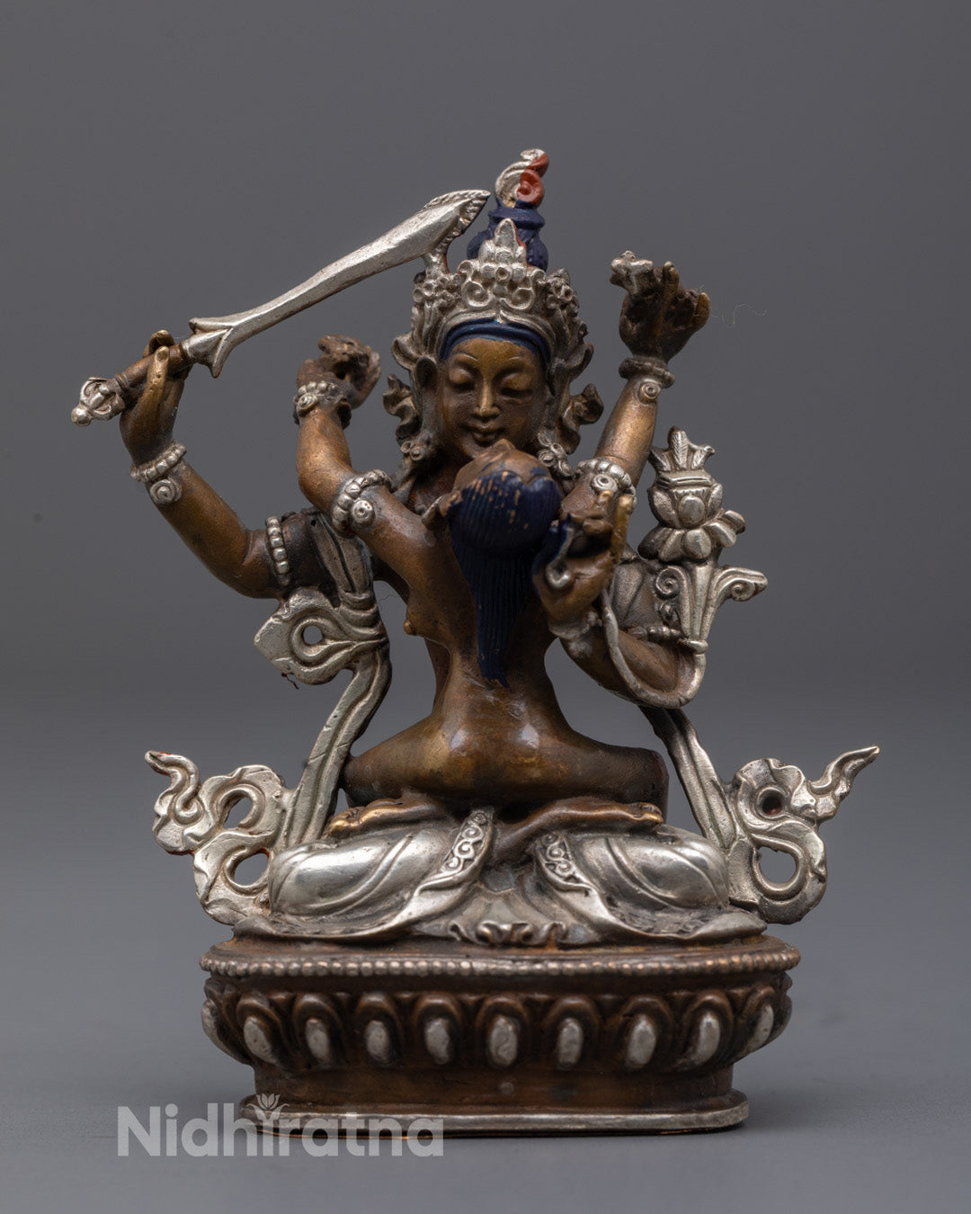 Manjushri Consort Statue with oxidized copper finish and double-edged sword of wisdom