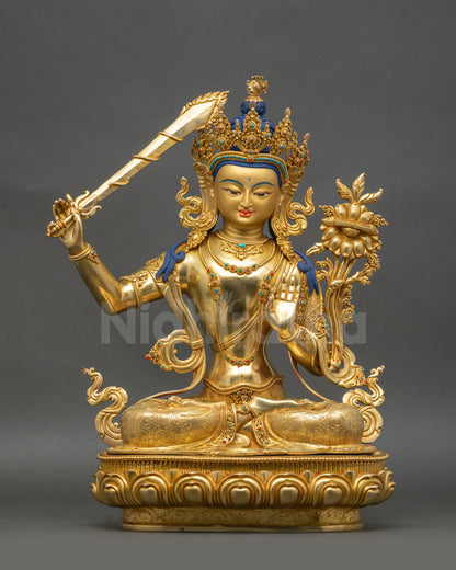 Manjushri Figurine front view hand-gilded copper Nepalese Buddhist sculpture