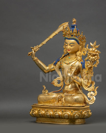 Manjushri Figurine left view side fire-gilded copper Nepalese sculpture