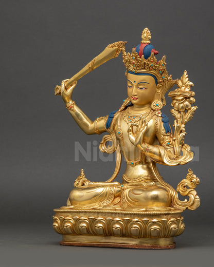 Manjushri Statue Left Side View Handcrafted Copper with Gold Highlights