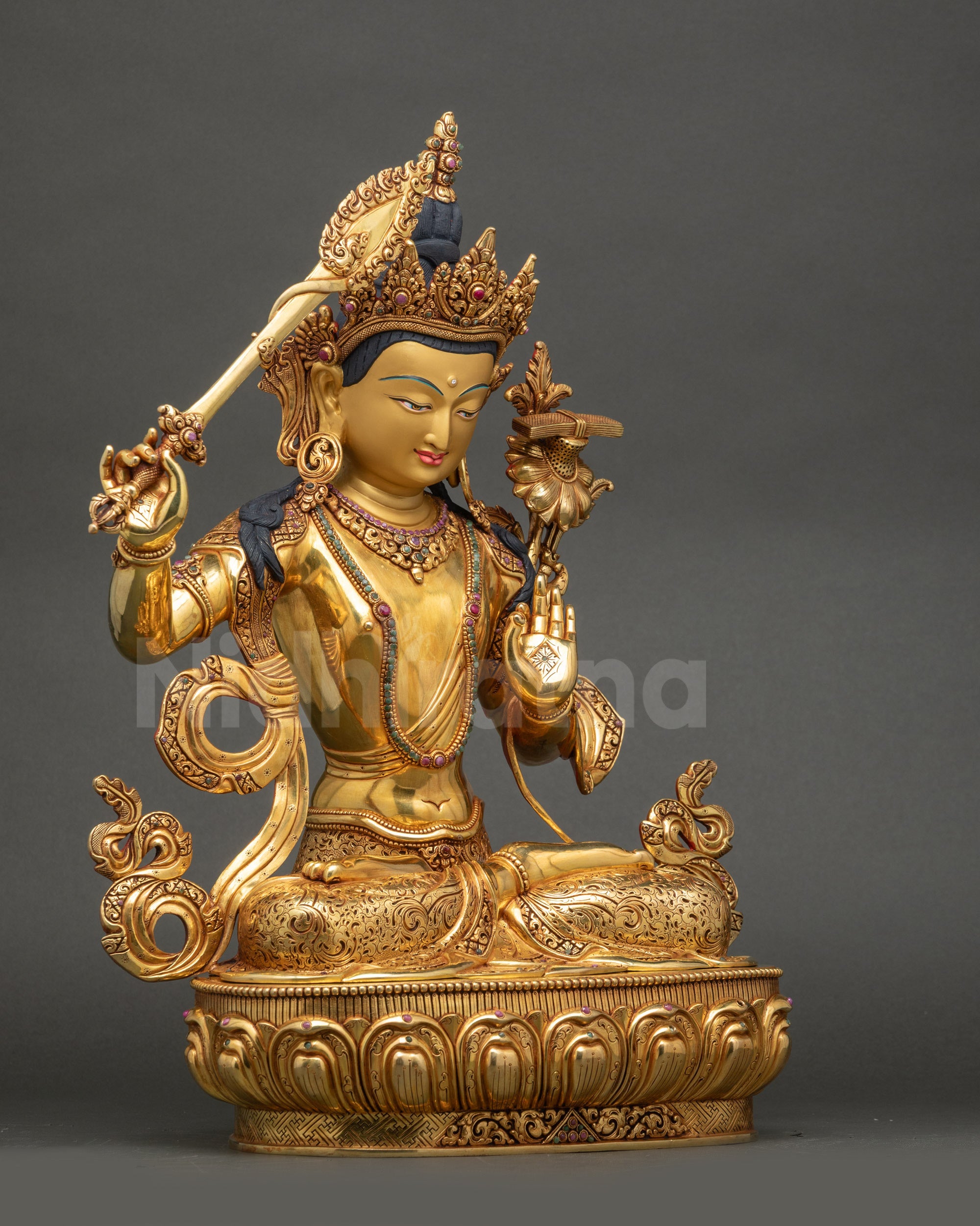 Manjushri Statue detailed gold face side view meditation Bodhisattva