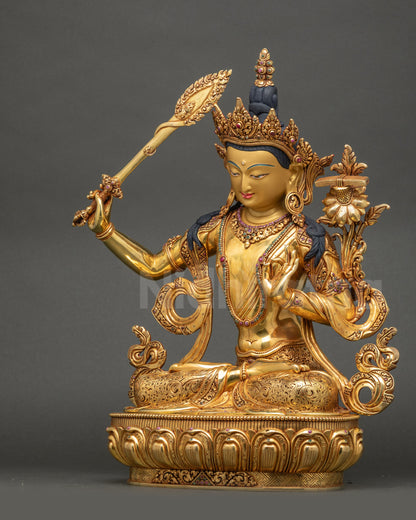 Manjushri Statue left side view intricate robes and lotus base Nepal
