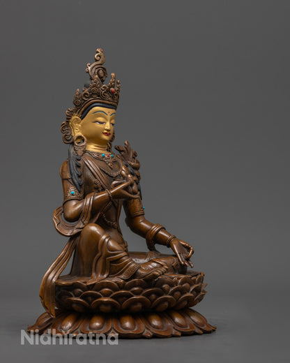 Manjushri Statue’s gold-gilded face and detailed crown, handcrafted using the traditional lost wax method.