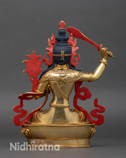 Manjushri statue back view, detailed robe carvings, floral motifs, home altar decor