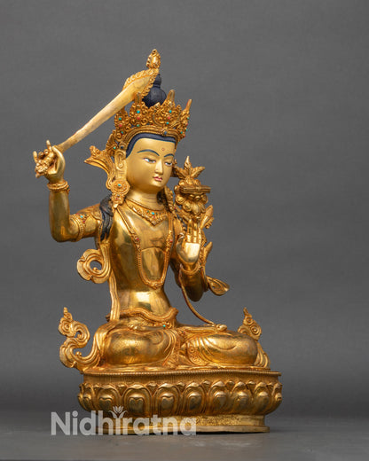 Manjushri statue holding flaming wisdom sword and utpala, Nepalese Buddhist altar art