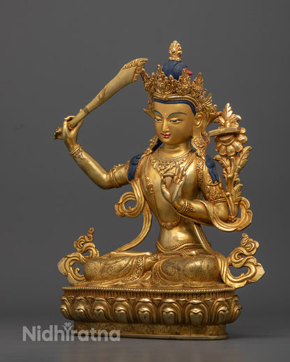 Manjushri statue in meditation space, 35.5cm tall, gold fire-gilded statue of Manjushri, the Bodhisattva of Wisdom, perfect for study rooms or spiritual altars, symbolizing insight and transcendent knowledge.