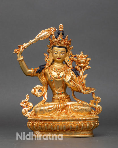 Manjushri statue on lotus throne, handcrafted Nepalese copper sculpture