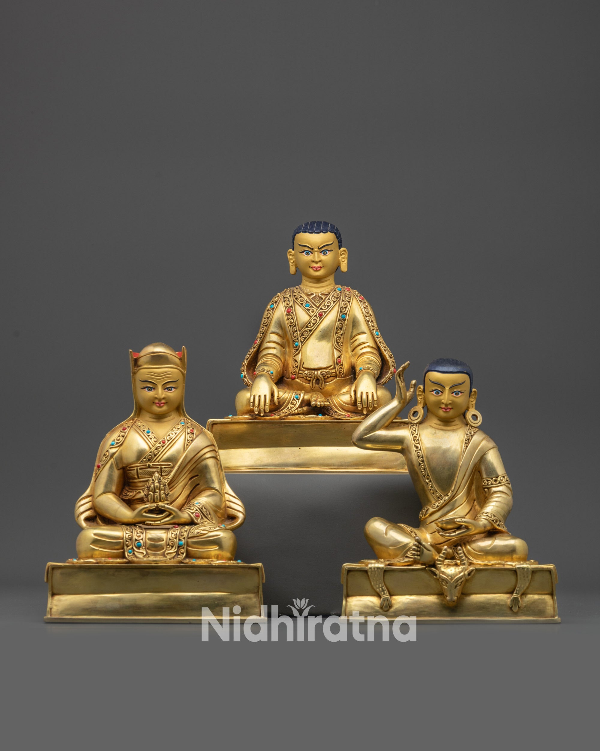 Marpha Statue Set front view 24K gold gilded Buddhist Masters Marpa Milarepa Gampopa handcrafted in Nepal lost wax art.