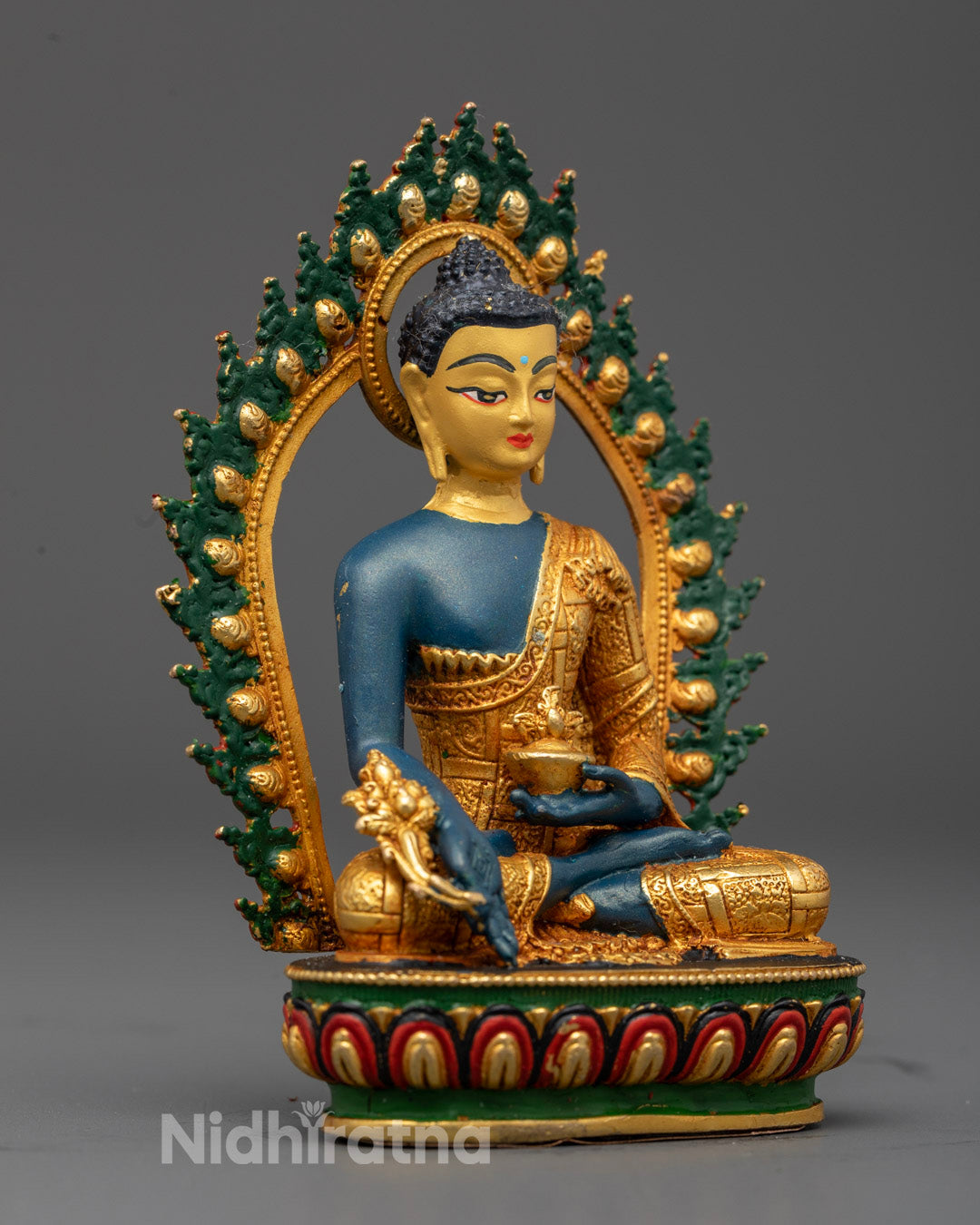 Electroplated Medicine Buddha sculpture symbolizing peace health and wellness ideal for meditation altar or home sanctuary