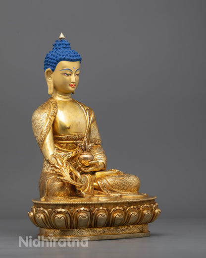 Side view of traditional Nepali-crafted Medicine Buddha statue, showcasing intricate details