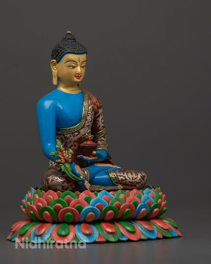 Medicine Buddha Statue showing intricate hand-painted acrylic designs on copper body, crafted in Nepal
