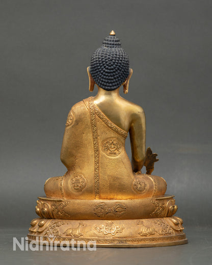 Medicine Buddha sculpture holding myrobalan stem and healing bowl, handmade in Nepal