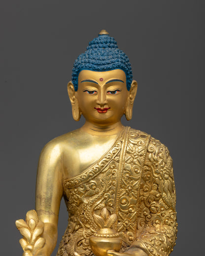 Medicine Buddha statue close up showing lotus seat and floral motifs