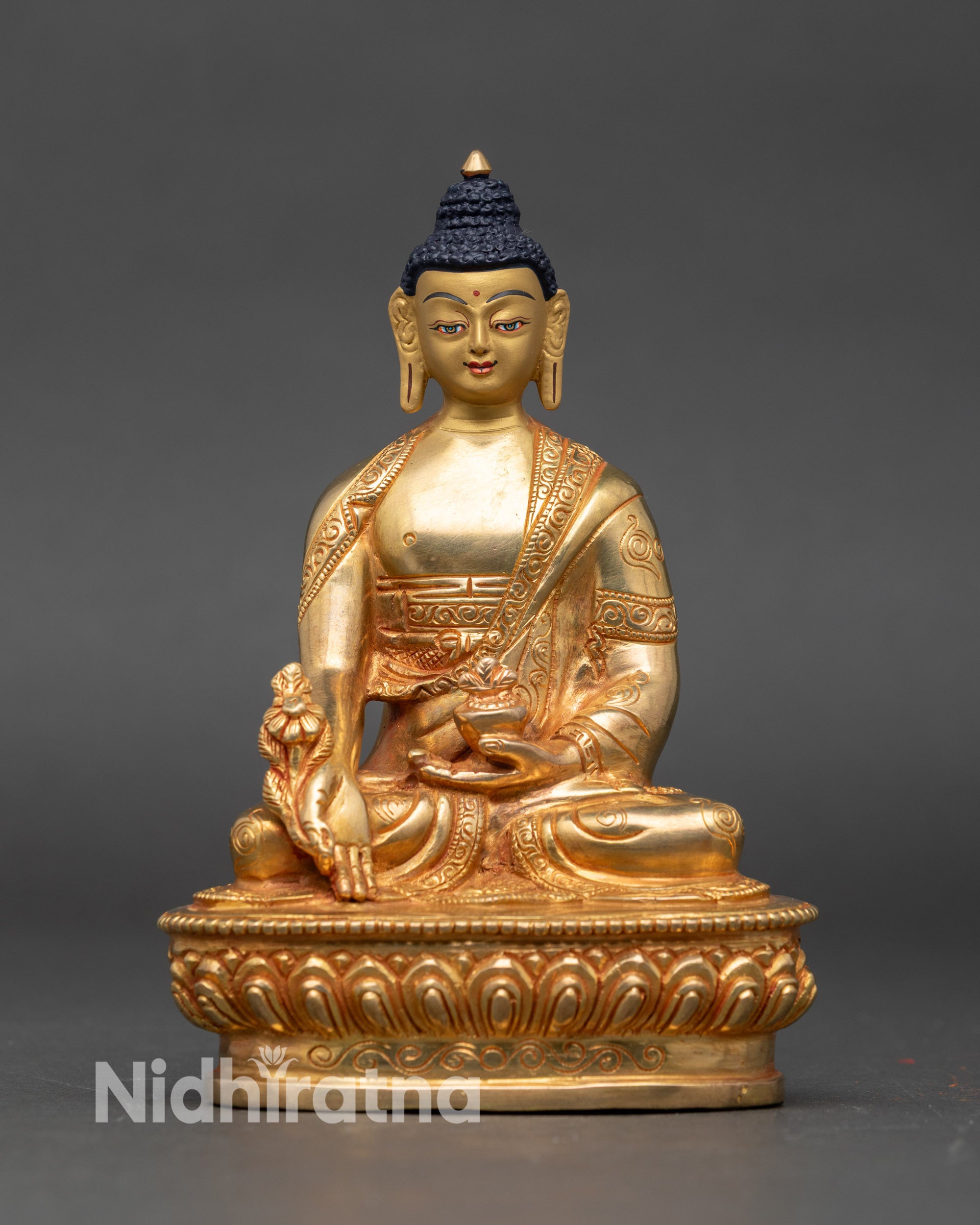 Medicine Buddha statue handcrafted in Nepal, gold fire-gilded copper for healing and meditation