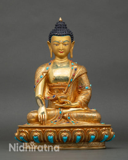 Meditating Buddha statue on lotus seat, handcrafted Nepalese copper and gold