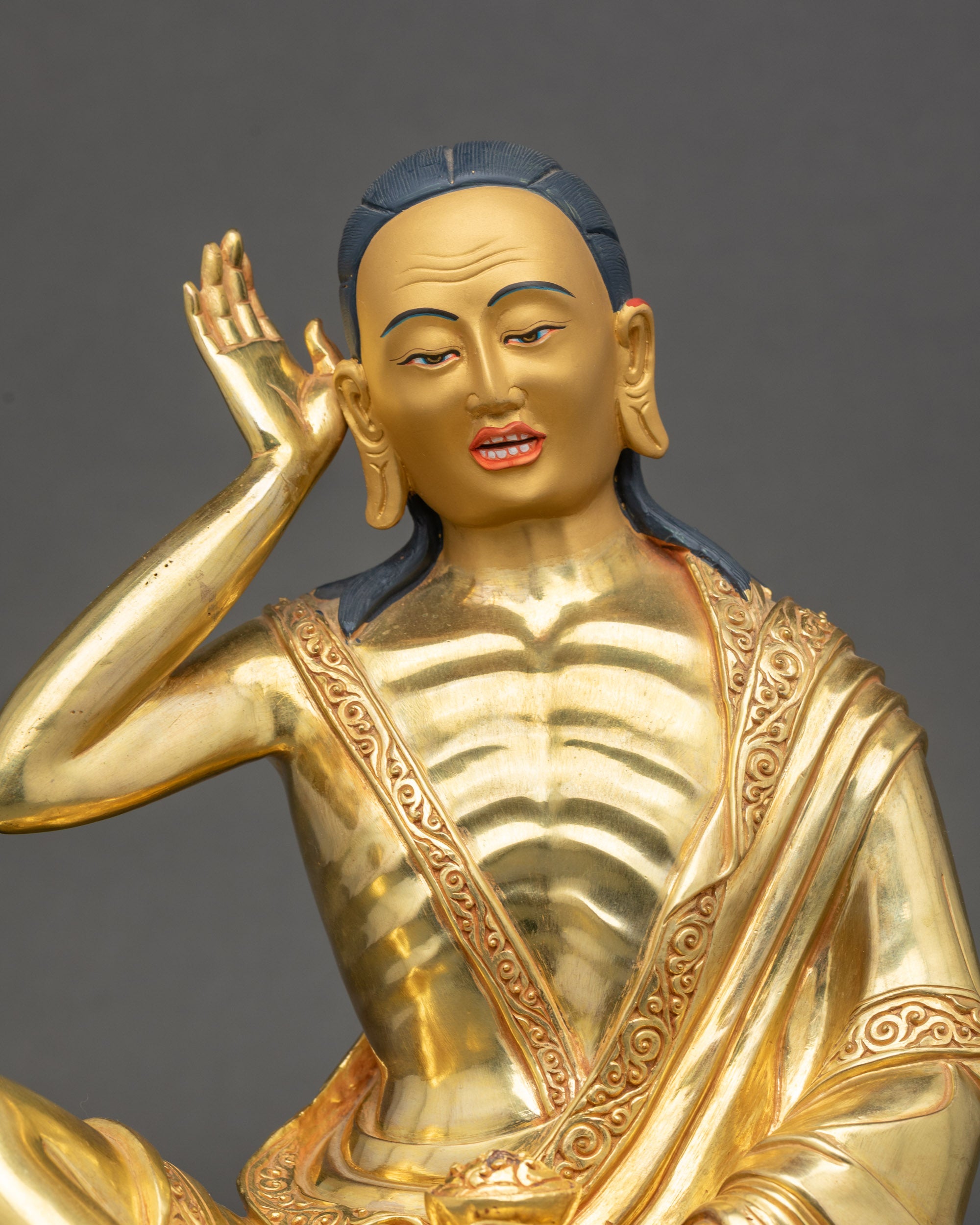 Milarepa Statue close up handcrafted gold-gilded copper figurine Nepal