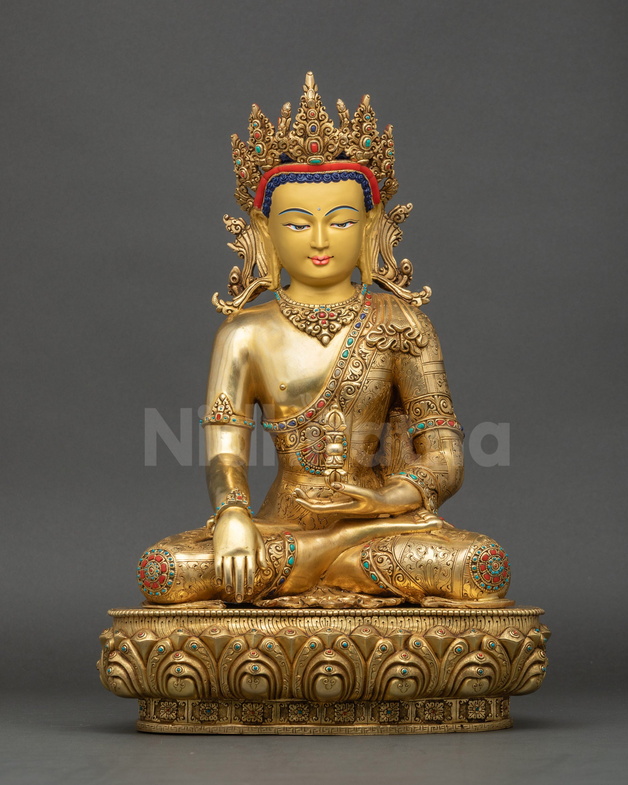 Mitrugpa Akshobhya Buddha statue seated on lotus with earth-touching mudra and Vajra, gold fire-gilded copper.