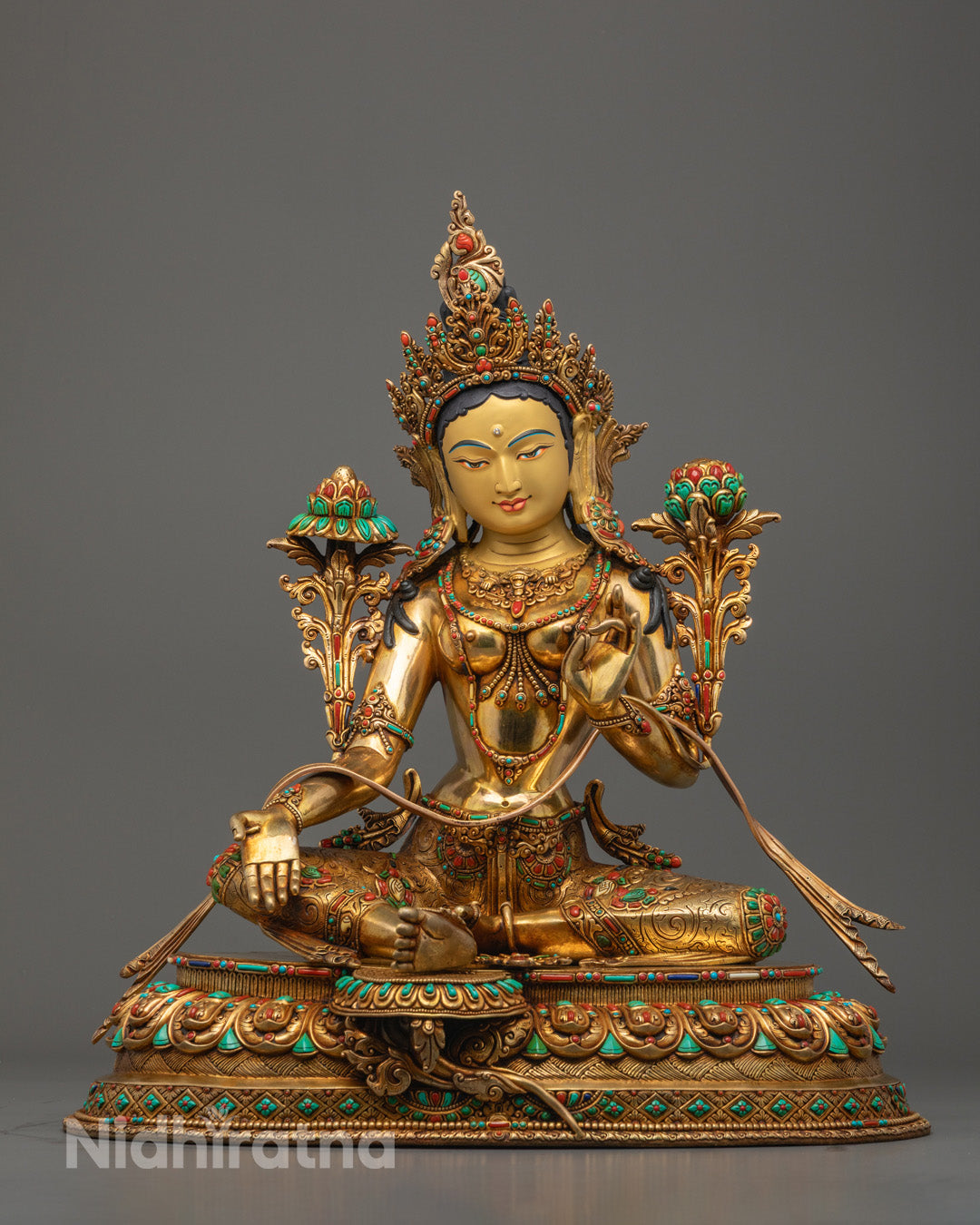 Mother Green Tara Sculpture with gold-gilded face and 24K fire-gilded body, adorned with semi-precious stones and vibrant acrylic paint