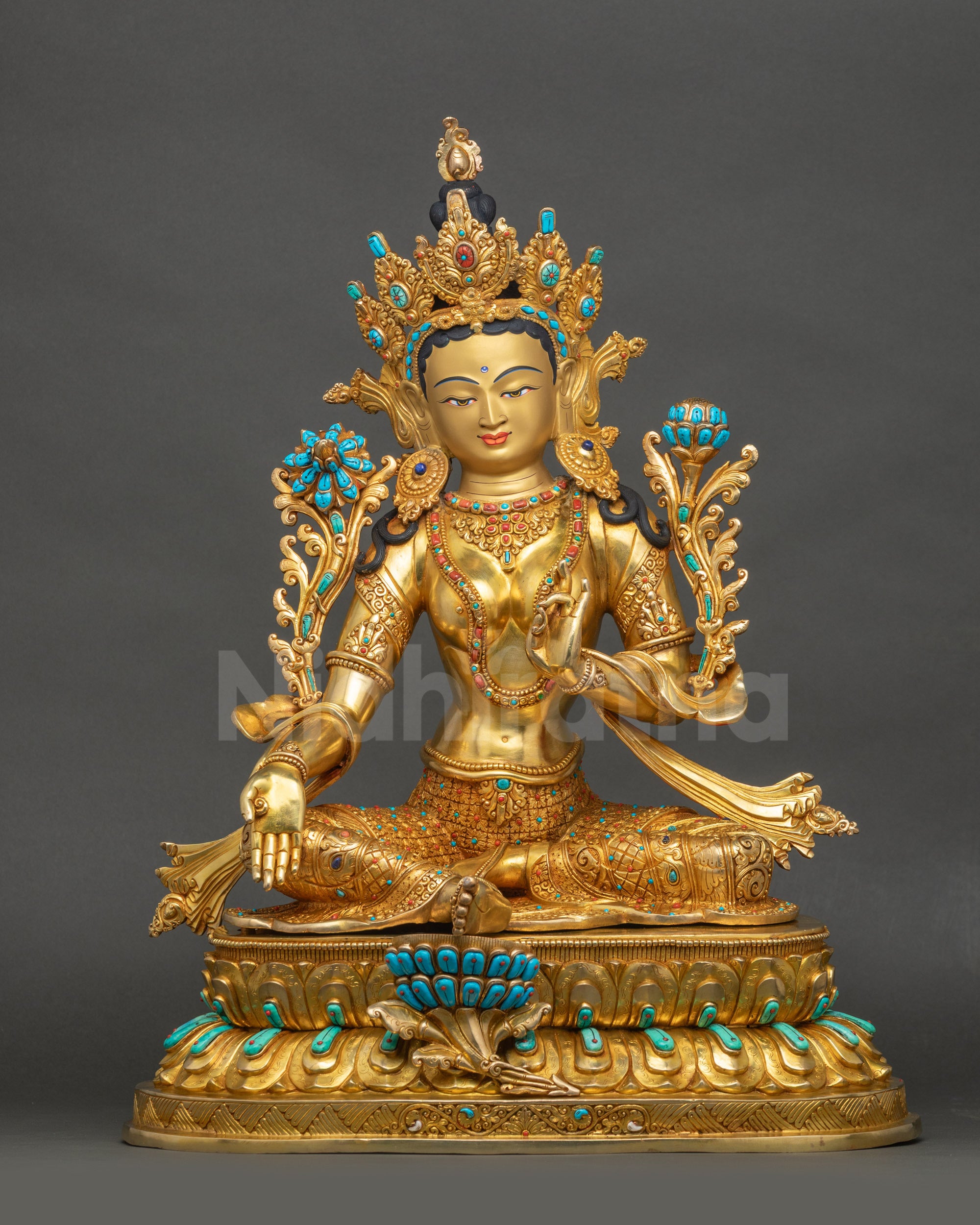 Mother Green Tara Statue showing gold-painted face, five-jeweled crown, and lotus seat