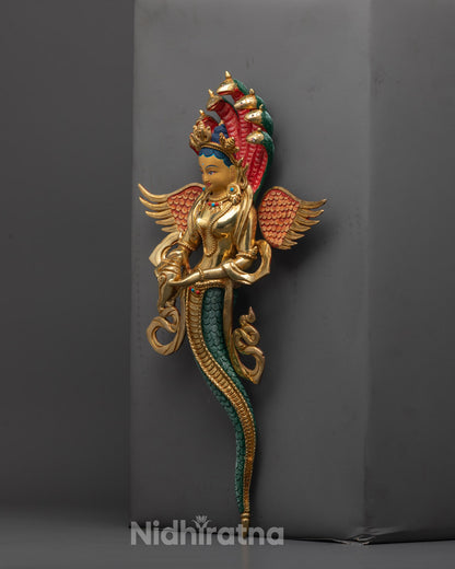 Back view of Naga Kanya Statue displaying fine details of the serpent tail